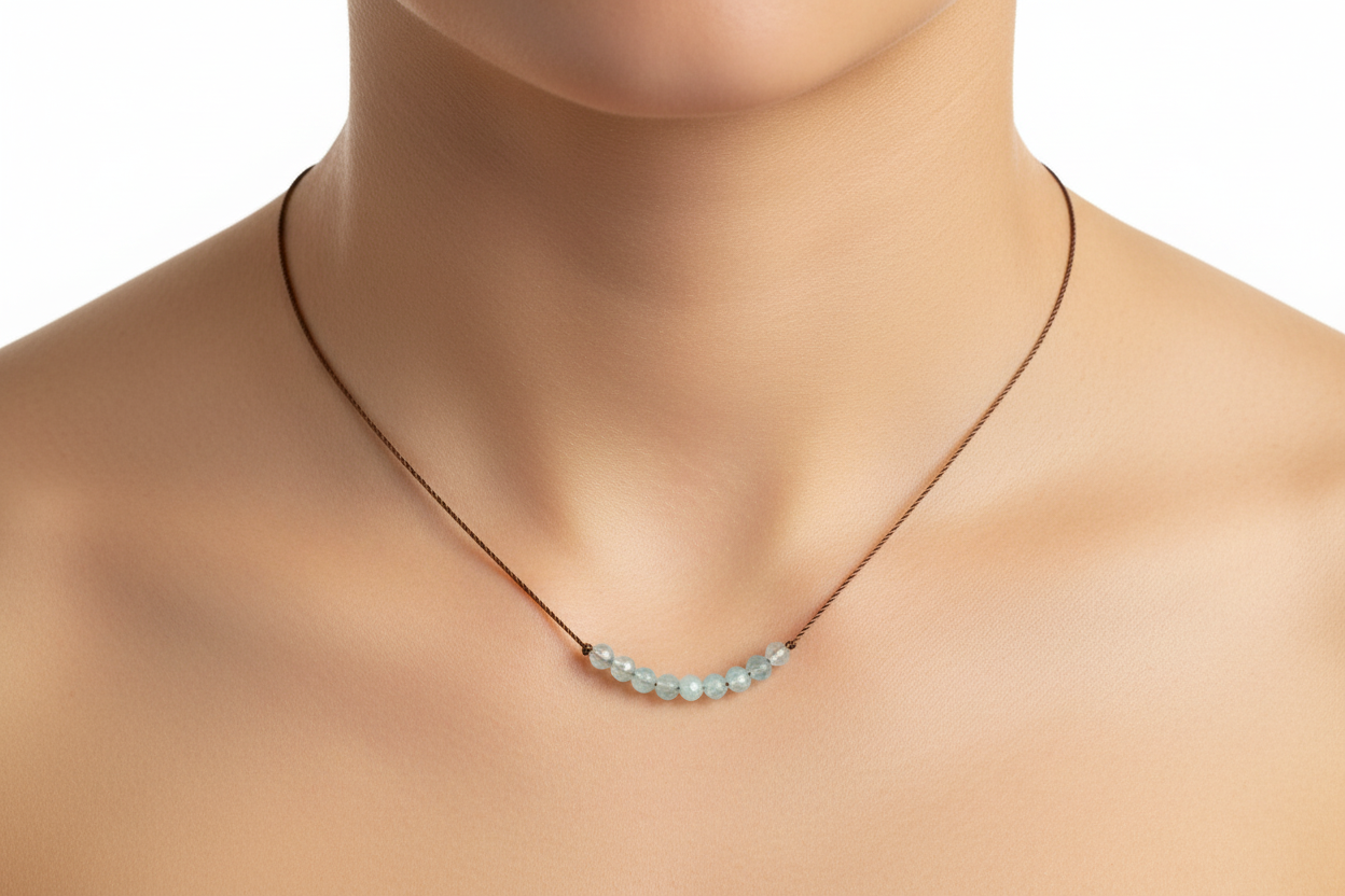Aquamarine necklace on model's neck