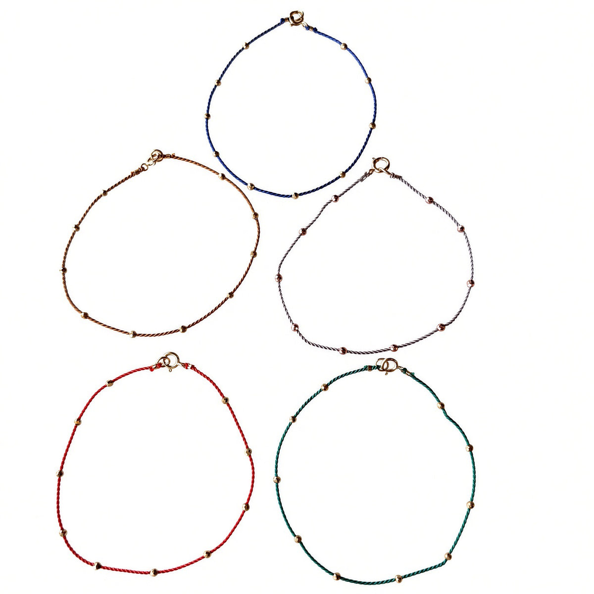 Floating Gold Beads Bracelet on Silk Cord