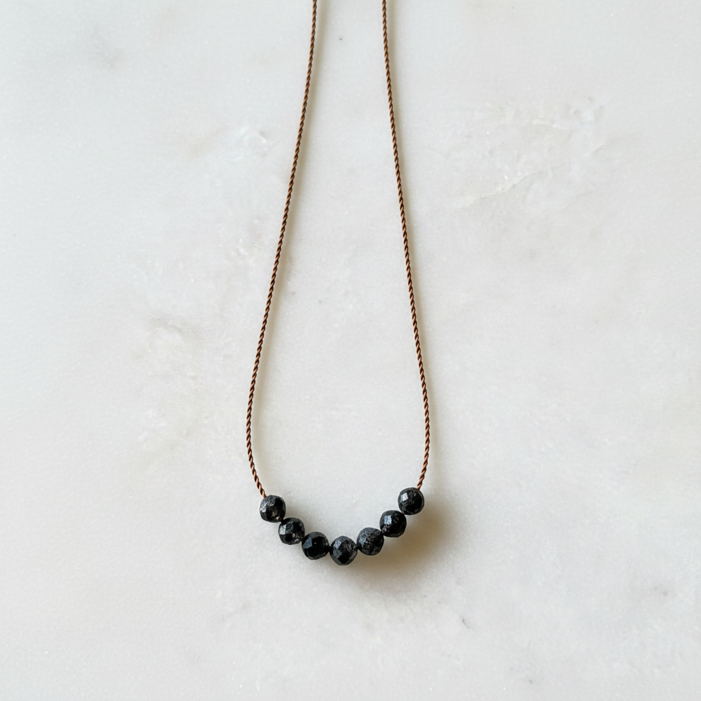 Black Quartz Necklace on White Background