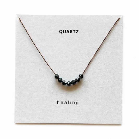 Quartz Healing Necklace on White Background