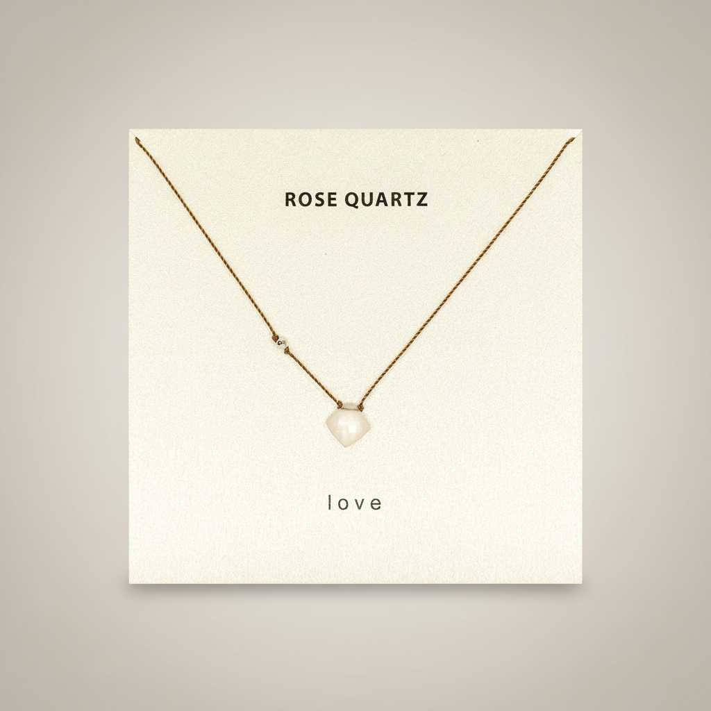 Rose quartz necklace on neutral background